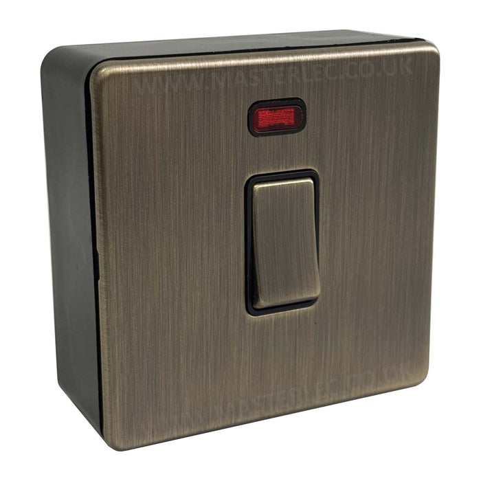 Antique Brass Screwless 20 Amp Double Pole Switch with Neon & 32mm Black Surface Pattress Back Box